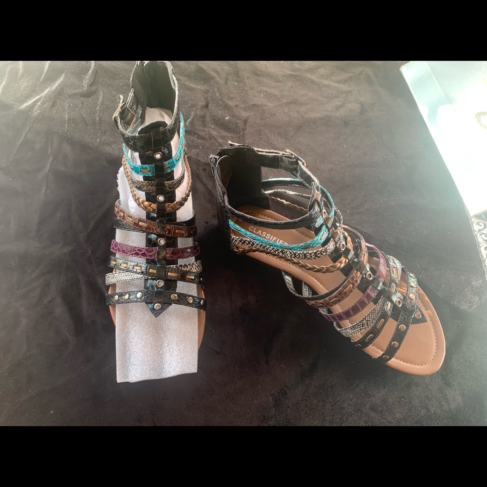 Size 7.5 gladiator flat sandals. Brand new.